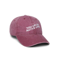 'YOU ARE ON NATIVE LAND DAD CAP - MAROON